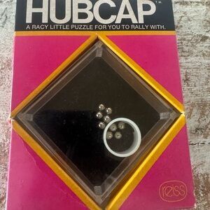 Reiss Hubcap Puzzle with Pink and Yellow Box